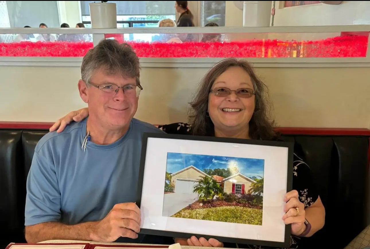 Marilynn Wolfe celebrating a closing